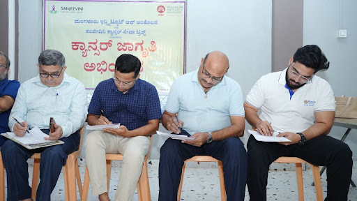 Community leaders and Rotary Club members from Kumta fill out cancer awareness survey forms at the "Arive Shakthi" dialogue programme