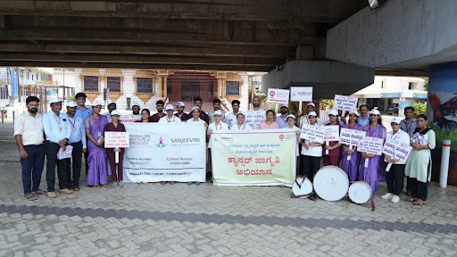 Participants of the Cancer Jagruthi Abhiyana gather at Shastri Circle, Kundapura, at the close of the awareness rally, representing the collective commitment of M.I.O and Sanjeevini Cancer Seva Trust to community cancer prevention in Udupi District.