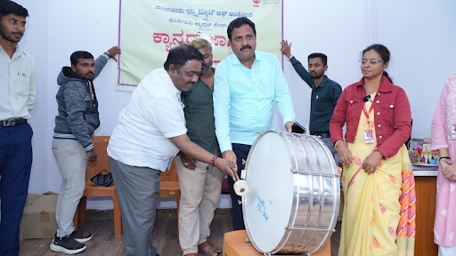 Sri Girish and Sri Ravindra Naik inaugurate the Shikaripura Cancer Awareness Rally by beating the drum