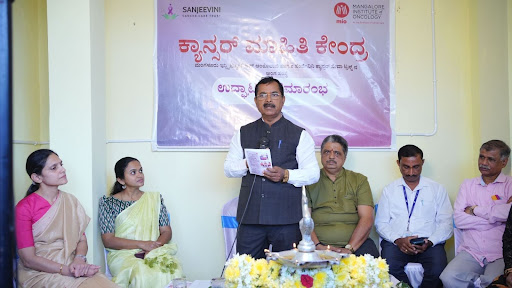 Sri Sudhakar S. Shetty, Founder President of Amma Foundation and JDS State Vice President, addresses the gathering at the Cancer Information Centre inauguration in Koppa